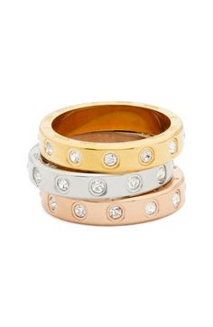 A trio of slim bands alight with cubic zirconia will bring subtle gleam to your everyday attire. 1/2" stackable width Assorted set of three Goldtone or silvertone plate/cubic zirconia Imported Summit Rings, Stone Collection, Stackable Ring, Women Set, Black Rings, Stackable Rings, Womens Jewelry Rings, Stone Ring, Kate Spade New York