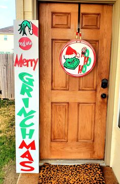 a door with a merry grino sign on it and a leopard print mat in front