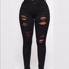 High Waisted Distressed Skinny Leg 65% Cotton 33% Rayon 2% Spandex Black Ripped Fitted Jeans, Stretch Ripped Black Jeans, Fitted Casual Jeans For Club, Black Stretch Ripped Jeans, Stretch Black Ripped Jeans, Fitted Distressed Black Jeans, Fitted Black Distressed Jeans, Black Fitted Ripped Bottoms, Fitted Black Ripped Bottoms