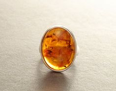 Boho Amber Ring Hipster Ring Silver Ring Sterling by KRAMIKE Modern Amber Oval Ring, Hipster Rings, Amber Ring, Amber Jewelry, Oval Stone, Ring Sterling Silver, Boho Rings, Buying Jewelry, Ring Silver