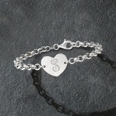 Ross-Simons - Plain - Italian Sterling Silver Heart Bracelet. 8". Here's a little extra love from Italy! Our charming sterling silver rolo bracelet features a lovely heart at the center. Perfectly giftable, this sweet sentiment will be treasured forever. Graduates from 3/16" to 5/8" wide. Lobster clasp, sterling silver heart bracelet. Yellow Gold Heart Necklace, Personalized Heart Bracelet, Monogram Hearts, Sterling Silver Heart Bracelet, Silver Initial Charms, Initial Charm Bracelet, Gold Heart Studs, Silver Monogram, Heart Locket Necklace