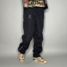 Vintage Bonetrager Track Pants Black Nylon Sweatpants Baggy Wide Leg 90s Skate / Streetwear Great Condition: 9/10 Men's Size: Medium My Hands in Pockets = It has Pockets No Hands in Pockets = Does Not Have Pockets Drawstring Will be Visible in Forward Pic, if not Visible it Does Not Have a Drawstring About me: I am 6' 0" for reference I generally wear a Large (32" inseam) I Model XS to 2XL sweatpants, I find that you can often size up or down with 95% of sweatpants and they fit the same Baggy 90s Black Bottoms, 90s Style Baggy Black Bottoms, 90s Style Baggy Black Pants, 90s Style Black Baggy Bottoms, 90s Style Black Baggy Pants, Black Nylon Parachute Pants For Hiking, Baggy Parachute Pants For Streetwear And Sportswear, Baggy Parachute Pants For Streetwear, 90s Style Baggy Parachute Pants For Streetwear