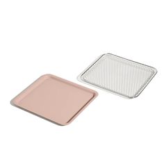 two square trays with one empty and the other half empty, on a white background