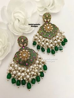 Premium Quality Kundan Meenakari Earrings/ Indian Jewelry/ Bollywood Jewelry/ High Quality Jewelry All items are shipped from Brampton, Ontario, Canada. If you need your item by a certain day, please reach out to us for express delivery option before placing the order so that we can update the shipping for you. Standard shipping/delivery timeline Below are the estimated delivery times after the order is shipped/dispatched.  ---> USA delivery timeline * 3-6 business days to major urban centers in USA. It may take 1-2 days extra to remote locations ---> Canada delivery timeline  * 2-3 business days - GTA  & Montreal  * 2-4  business days - Rest of Ontario/Quebec * 3-6 business days-  Rest of Canada (Please consider 1-2 extra business days to very remote locations)    ---> Europe/Middle East Green Bridal Earrings With Cutdana As Gift, Green Cutdana Bridal Earrings As Gift, Elegant Ceremonial Earrings With Motifs, Green Round Meenakari Bridal Earrings, Green Meenakari Bridal Earrings, Green Festive Ceremonial Earrings, Green Meenakari Earrings For Gift, Green Meenakari Temple Jewelry Earrings, Green Meenakari Dangle Danglers