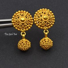 Thank you for coming in!  Spectacular 22K solid yellow gold earrings with bell design and beautiful filigree and granulation details!  Looks much much nicer in person! You'll get the pair of earrings  you see! WEIGHT: 8.75 Grams DIMENSION: 15.88mm ear post, 9.8mm Sphere, 1.25 Inch Total Length MATERIAL: 22K Solid Yellow Gold Seema Anand, Bell Earrings, Bell Design, Gold Bridal Jewellery Sets, Yellow Gold Earrings, Jewellery Sets, Yellow Gold Earring, Bridal Jewellery, Solid Yellow