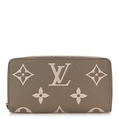 This is an authentic LOUIS VUITTON Empreinte Monogram Giant Zippy Wallet in Tourterelle and Creme. This chic wallet is crafted of Louis Vuitton monogram embossed leather in a taupe and cream. The wallet features a wrap around zipper that opens to a leather interior lined with card slots, patch pockets and a partition zippered compartment. Checkbook Wallet, Louis Vuitton Empreinte, Louis Vuitton Vernis, Dog Valentines, Louis Vuitton Damier Azur, Louis Vuitton Wallet, Wallet Fashion, Wallet Chain, Leather Interior