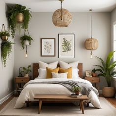 a bedroom with plants hanging above the bed