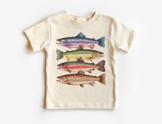 Abstract Colorful Trout In A Row Toddler Shirt - River Fish Species - Fishing With Daddy - Natural Boho Adult, Toddler & Youth Tee If you love super soft, lightweight, extremely comfy shirts and baby bodysuits then you will absolutely love our unisex kids shirts and baby bodysuits! These shirts are hand printed with a professional garment printer for a soft, durable, long lasting, printed graphic using high quality water based inks. * The printed design is very soft to the touch due to our print Summer Camp Shirt, River Fish, Fish Shirt, Fish Species, Natural Boho, River Fishing, Comfy Shirts, Kid Tees, Kids Tops