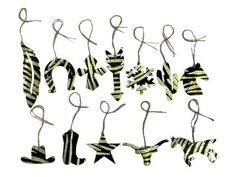 an assortment of green and black striped clothes hanging from hooks on white background with text