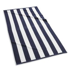 a blue and white striped towel on a white background