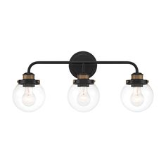 three light bathroom fixture with glass globes on an old - fashioned black metal frame