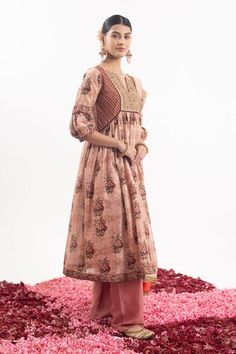 Peach anarkali with embroidered yoke and all over floral bloom prints. Paired with a pant and dupatta with floral butti prints and embroidered border. - Aza Fashions Peach Anarkali Set For Designer Wear, Fitted Peach Anarkali Set, Designer Wear Straight Kurta In Peach, Designer Peach Anarkali Set With Sheer Dupatta, Festive Peach Anarkali Set With Straight Kurta, Fitted Peach Bollywood Anarkali Set, Peach Anarkali Set For Diwali With Traditional Drape, Peach Floor-length Anarkali Set For Festive Occasions, Peach Floor-length Anarkali Set