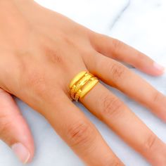 This 22k gold ring, weighing 5.3 grams, exudes iconic elegance with its radiant and reflective design. The yellow gold finish enhances its luxurious appearance, making it perfect for any special occasion. With a ring size of 7.5 and sizing available, it ensures a comfortable and precise fit. Ideal for those who appreciate timeless and sophisticated jewelry, this ring seamlessly complements both formal and glamorous outfits. Its striking design and brilliant gold make it a standout piece in any c Elegant 22k Gold Toe Ring, 22k Yellow Gold Toe Rings, 22k Gold Toe Ring For Anniversary, 22k Gold Toe Rings In Yellow Gold, Classic 22k Gold Ring, Yellow Gold 22k Toe Rings, 22k Gold Open Ring, 22k Gold Open Ring For Anniversary, 22k Gold Toe Ring