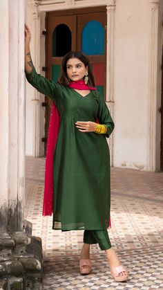 Bring on the festive spirit with our kurta set in chanderi silk. Fully lined kurta and pants. Made in chanderi silk. Dupatta in mul cotton with intricate tikki details. Color of Kurta + Pants : Dark Green. Color of Dupatta : Rani Pink. Model height is 5.3” and is wearing a size S. Wash Care : Dry Clean Only Dark Green Kurta Woman, Festive Tussar Silk Kurta With Zari Work, Designer Cotton Silk Kurta With Traditional Drape, Long Sleeve Slub Silk Anarkali Set For Festivals, Festive Tussar Silk Palazzo Set For Eid, Slub Silk Kurta With Cutdana For Diwali, Navratri Tussar Silk Kurta With Zari Work, Eid Festive Tussar Silk Palazzo Set, Festive Eid Tussar Silk Palazzo Set