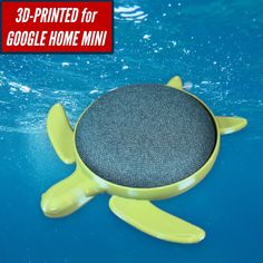 the 3d printed for google home mini is shown in blue water with an image of a turtle on it's back