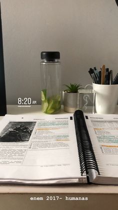 an open book sitting on top of a desk