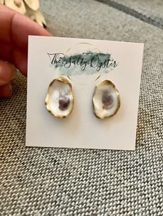 "Beautiful, dainty oyster shell earrings.  These measure approximately 3/4\" -1\" These are so cute for everyday wear but can also be dressed up, they are so versatile!    Every shell is handpicked by my family and I. I meticulously clean them, paint them and seal them. **free shipping on orders over $35, no code needed." Shell-shaped Pearl Drop Earrings For Gifts, Shell-shaped Pearl Charm Earrings As Gift, Nickel-free Shell Gift, Gift Shell-shaped Mother Of Pearl Earrings, Pearl Drop Shell As A Gift, Pearl Drop Shell-shaped Earrings For Gift, Ocean-inspired Shell Earrings For Gifts, Ocean-inspired Shell Earrings As Gift, Nickel-free Shell-shaped Earrings Gift