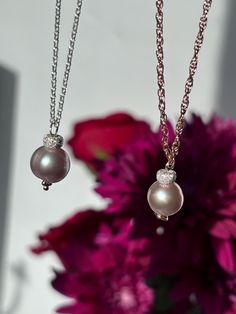 This listing is for a Pink Pearl Charm Necklace.  Choose between the sterling silver version Or the mixed metal version which features rose gold tone wire and a sterling silver bead. Then choose between a sterling silver chain or a rose gold filled chain, and the length of your choice.  These natural fresh water pearls are a beautiful shade of pink and some have minor indentations and or marks.  Pearls are apprx  between 9mm-10mm Comes in a gift box. Free Us Shipping. When you purchase from The Finds Within, you are supporting a Hispanic woman owned small business based in the sunny city of Miami, Florida. This is a one woman show, I personally source, design and hand make everything you see available. In addition, I am the shop photographer, product lister, order shipper and customer serv Rose Gold Jewelry With Round Pendant And Cable Chain, Elegant Rose Gold Chain Necklace With Round Pendant, Elegant Rose Gold Round Pendant Chain Necklace, Anniversary Rose Gold Necklace With Pearl Pendant, Rose Gold Sterling Silver Chain Necklace, Rose Gold Sterling Silver Chain Necklace Gift, Rose Gold Chain Jewelry Gift, Elegant Pink Jewelry With Chain Detail, Elegant Pink Jewelry With Chain