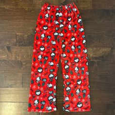 Super Cute And Very Soft Hello Kitty Pajama Pants In A Christmas Theme. Brand New And Never Worn, Without Tags. Size: Os (Would Likely Best Fit A Womens Small Or A Kids Xl/Xxl, Please Check Measurements To Ensure Appropriate Fit) Approximate Measurements: Waist (Unstretched): 12” Waist (Stretched): 15” Inseam: 27” Cozy Red Christmas Sleepwear, Christmas Loungewear Pants, Cozy Bottoms For Winter Sleepover, Cozy Bottoms For Sleepover In Winter, Red Winter Sleep Bottoms, Red Long Pants Bottoms For Bedtime, Red Long Bottoms For Bedtime, Red Long Pants For Bedtime, Red Holiday Long Pants