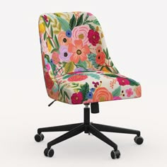 a colorful office chair with wheels and flowers on the seat, against a white background