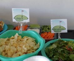 several bowls filled with food on top of a table