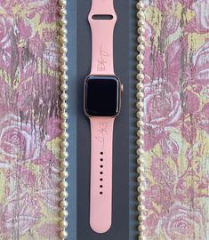 *Your engraved Apple Watch Band is handmade and therefore unique and one of a kind!   *Color in photos: Rose Pink  *Watch Size: Compatible with 38mm, 40mm, 41mm, 42mm, 44mm, 45mm watch sizes.  *Watch Band Lengths:   38/40/41mm - Small/Medium fits wrist circumference 5.1-7.1 inches (130-180 mm) - Medium/Large fits wrist circumference 5.9-7.9 inches (150-200 mm)   42/44/45mm - Small/Medium fits wrist circumference 5.5-7.3 inches (140-185 mm) - Medium/Large fits wrist circumference 6.3-8.3 inches (160-210 mm) *Watch Band Material: Silicone *If you have any specific pattern requests, please message me. :) *Any questions, comments, or concerns...please feel free to contact me. Handmade Pink Watch Bands As Gift, Personalized Pink Watch Accessories For Gift, Personalized Pink Watch Accessories Gift, Personalized Pink Apple Watch Band For Gift, Personalized Pink Apple Watch Band As Gift, Rose Watch, Engraved Flower, Pink Watch, Rose Pink