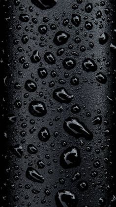 drops of water on the surface of a bottle