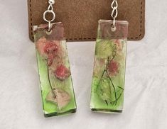 1.5" Handmade resin earrings. Resin Earrings For Gifts, Unique Resin Earrings For Gifts, Resin Flower Earrings With Ear Wire As Gift, Resin Drop Earrings For Gift, Green Flower Earrings As Gift, Clear Resin Earrings, Resin Flower Earrings With Ear Wire For Gift, Green Rectangular Earrings As A Gift, Resin Flower Earrings Gift