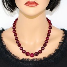 ♥ Ready to ship ♥ 100% handmade ♥ Packed in a gift box ♥ Custom length ♥ Gemstone: Genuine faceted ruby red agate (other colors available, just contact me) ♥ Bead size 12mm Handmade Ruby Red Agate Bold Statement Necklace! This one-of-a-kind piece embodies the perfect fusion of elegance and boldness.  The magnificent, deep red hue of the Ruby Red Agate beads effortlessly catches the eye, exuding a captivating charm.  Each bead is meticulously handpicked and threaded with care, resulting in a trul Burgundy Beaded Necklaces With Round Beads As Gift, Garnet Round Beads Necklace For Gift, Garnet Round Bead Necklace For Gift, Garnet Bead Necklaces For Gifts, Garnet Beaded Necklaces As Gift, Elegant Red Crystal Necklaces With Natural Stones, Elegant Red Crystal Necklace With Natural Stones, Handmade Burgundy Beaded Necklaces As Gift, Handmade Burgundy Beaded Necklaces For Gifts