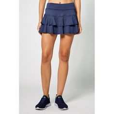 LIJA's Match tennis skort is one of our all-time top selling pieces with its layered flounce. This luxe nylon stretch fabric is perfect for movement and breathability. The fitted waistband and undershorts create a seamless fit. A must-add to your closet. 13" length skort. Size: L.  Color: Blue. Tennis Racquets, Tennis Skirts, Tennis Skort, Sport Tennis, Top Selling, Dark Navy, Dress Skirt, Stretch Fabric, Tennis