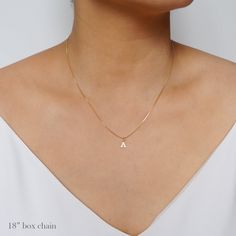 Elegant and dainty. A tiny 14K gold filled initial is delicately suspended on a 14K gold-fill necklace chain. *Free shipping for orders to USA and Canada, and no duties or customs fees.* > Comes beautifully packaged and ready for gift giving > Looks lovely layered with other necklaces . . . . . . . . . . . . . . . . . . . . . . . . . . . . . . . . . . . . . . . . . . WHAT IS 14K GOLD FILL 14K Gold fill is a beautiful alternative to solid gold, as it offers the ideal balance of quality and Minimalist Tiny Charm Necklaces For Anniversary, Tiny Minimalist Charm Necklace For Anniversary, Minimalist Tiny Charm Necklace For Anniversary, Simple Tiny Initial Pendant Charm Necklaces, Simple Tiny Initial Pendant Charm Necklace, Simple Tiny Initial Pendant Necklace, Minimalist 14k Gold Filled Initial Necklace Gift, Dainty 14k Gold Name Necklace With Birthstone, Minimalist 14k Gold Filled Charm Necklace With Initial Pendant