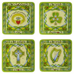 four coasters with irish symbols on them, each decorated in green and yellow colors