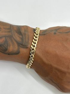 This is a 14K Yellow Gold Miami Cuban bracelet with 6.5-6.7mm links. It's made in a 14K gold semi-hollow style, which means you can still have the big bold look the Miami Cubans are well-known for but without the huge price tag. It's perfect for everyday wear. Great size for both men and women. Please be mindful of the bracelet length for those with smaller wrists. Be sure to measure wrist or ankle before purchasing.   ~ Approximately 6.5-6.7mm wide  ~ Real 14K yellow gold  ~ Semi-hollow/semi-so Cuban Link Bracelet Men Gold, Men’s Bracelets In Gold, Mens Gold Bracelet, Cuban Bracelet, Father Time, Miami Cuban Link Chain, Mens Gold Bracelets, Miami Cuban, Linking Rings