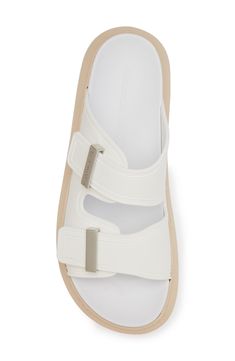 Streamlined bar hardware underscores the eye-catching look of a double-band slide sandal boasting a chunky platform and flexible jelly upper. 1 3/4" (44mm) heel; 1" platform (size 38.5) Synthetic upper, lining and sole Made in Italy Designer Shoes Modern White Leather Slides, Modern Slides With Buckle Closure For Beach, Modern Beach Slides With Buckle Closure, Modern White Slides With Textured Footbed, White Double Strap Slides For The Beach, White Double Strap Slides For Beach, Modern White Leather Footbed Sandals, Chic White Slides With Textured Footbed, Modern White Slides For Spring