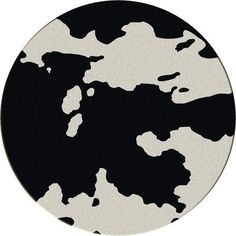 a black and white circle with an abstract design