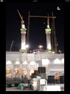 an image of a building under construction at night