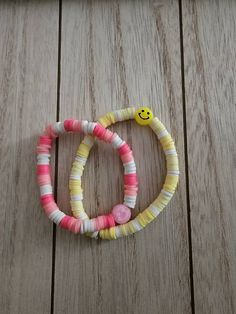 Smiley Bracelets can be customized for children and adults Affordable Trendy Stretch Bracelet With Smiley Face, Make Clay Beads, Heishi Bracelets, Thigh Workout, Clay Bead Necklace, Preppy Bracelets, Clay Bracelet, Diy Bracelets Patterns, Beads Bracelets