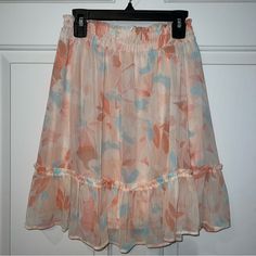 Lauren Conrad Mini Skirt In Floral, Size S Never Worn. Peach Color With Pastel Accents, Elastic Waist, Fully Lined. Falls Amid-Quad. Peach Color, Lc Lauren Conrad, Lauren Conrad, Orange Pink, Pink Orange, Quad, Pink And Orange, Mini Skirt, Elastic Waist