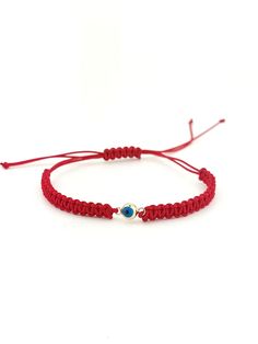 This handmade red string bracelet symbolizes your protection from evil with its evil eye bead detail. "This stylish and elegant accessory, which is suitable for every wrist with its adjustable design, is ideal for daily use and can be a special gift for a loved one. Red Bracelet For Protection, Red Braided Bracelet With Evil Eye For Gift, Handmade Adjustable Red Evil Eye Bracelet, Red Adjustable Evil Eye Bracelet, Adjustable Red Evil Eye Bracelet Hand-strung, Red String Bracelet, Protection Bracelet, String Bracelet, Evil Eye Charm