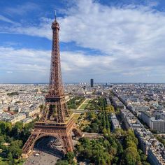 an aerial view of the eiffel tower in paris, france on a sunny day