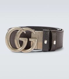 Crafted in Italy from leather, this black belt from Gucci features the label's double G buckle logo in antique silver, this style comes with punch holes for an adjustable fit. It is also reversible and comes in black and brown..Color of fastening: antique silver.Comes with dust bag.Reversible.Made in Italy.Material: calf leather.Width 3,5cm-1.5'.Buckle width 5cm-2' Black Leather Belt Buckle With Metal Logo, Modern Black Belt With Silver-tone Logo Plaque, Modern Black Belts With Silver-tone Logo Plaque, Modern Black Belts With Silver-tone Logo, Designer Black Belt Buckle With Silver-tone Logo, Designer Black Belt Buckles With Silver-tone Logo, Designer Silver Belt With Buckle Closure, Luxury Black Belt With Silver-tone Logo Plaque, Luxury Black Belt With Silver-tone Logo