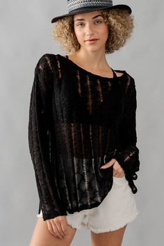 Introducing the Whispering Threads sheer distressed women's sweater! With its long sleeves and round neckline, this top offers a loose and comfortable fit. The see through lace adds a touch of delicate style, while the distressed details give it a unique edge. Perfect for those who love to make a statement with their fashion choices! Gorgeously soft with stretch. 100% Acrylic. Model is wearing a size small. She is 5'8". See size chart for sizing info. Sheer Long Sleeve Sweater For Fall, Long Sleeve Open Knit Top For Layering, Sheer Long Sleeve Sweater For Spring, Distressed Long Sleeve Sweater, Crochet Sweater Distressed, Distressed Cotton Long Sleeve Sweater, Distressed Crochet Knit Sweater, Seethrough Knit Sweater, Distressed Knitwear