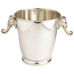 an elephant shaped silver cup on a white background