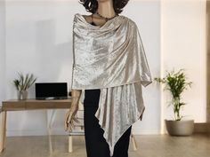 fir for all size  27.56" x 79" / 70cm x 200cm The model on the photo is S/M size and the shoulder around of her is 41 inches (105 cm) also please notice your bust size too you can use this shawl in every season. Its slightly sparkles on the sun or light If there will be a very slight color difference its because of monitor's brightness and light effects ALL ITEMS : https://www.etsy.com/shop/ArtvolayAccessories If there will be a very slight color difference its because of monitor's brightness an Elegant Beige Formal Shawl, Gold Fitted Shawl For Party, Fitted Gold Shawl For Party, Elegant Evening Shawl Wrap, Elegant Beige Scarf Wrap, Elegant Beige Wrap Scarf, Elegant Wrap Shrug For Party, Elegant Party Wrap Shrug, Elegant Cream Shawl For Evening