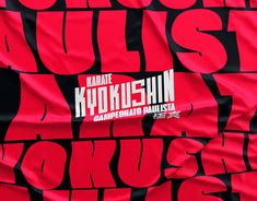 a red and black poster with the words kore kurokshi in bold font