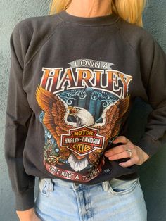 DATED FROM 1986. LAID FLAT, THE SWEATSHIRT MEASURES 20.5" ACROSS THE CHEST FROM UNDERARM TO UNDERARM AND 23" LONG FROM THE TOP OF THE SHOULDER TO THE BOTTOM HEM. THE SIZE TAG SAYS IT'S A MEDIUM. IT'S IN EXCELLENT CONDITION FOR IT'S AGE. Retro Crew Neck Pre-shrunk Top, Biker Streetwear Tops For Fall, Biker Style Tops For Fall Streetwear, Cotton Biker Tops With Letter Print, Biker Style Tops For Streetwear In Fall, Fall Streetwear Biker Tops, Retro Embroidered Graphic Tops For Fall, Retro Embroidered Tops For Fall, Retro Embroidered Streetwear Tops