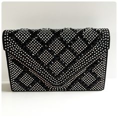 Black Ab Rhinestone Clutch Handbag Chain Included Approximately 8x5.25x1.75 Black Evening Bags With Bling, Chic Black Evening Bag With Rhinestones, Black Rhinestone Clutch For Party, Black Evening Bag With Rhinestones, Black Rhinestone Evening Bag, Luxury Black Rhinestone Shoulder Bag, Black Shoulder Bag With Chain Strap For Events, Black Rhinestone Shoulder Bag For Events, Black Clutch With Rhinestones For Events