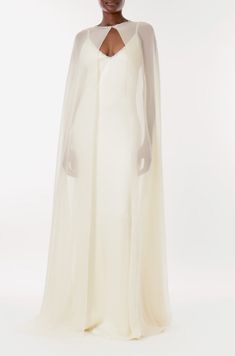 Chiffon Evening Cape – Monique Lhuillier Elegant Georgette Dress For Ceremony, Silk Evening Dress With Cape Sleeves For Wedding, Chiffon Wedding Gown With Cape Sleeves, Silk Chiffon Evening Dress With Sheer Bodice For Wedding, Wedding Evening Dress With Sheer Bodice In Silk Chiffon, Wedding Evening Dress With Sheer Bodice And Silk Chiffon, Organza Cape Dress For Wedding, Wedding Gown In Sheer Silk Chiffon, Chiffon Evening Dress With Cape Sleeves For Formal Occasions