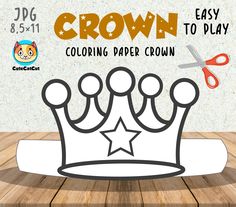 a paper crown sitting on top of a wooden table