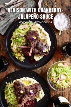 two black plates topped with steak and coleslaw next to wine glasses on a wooden table